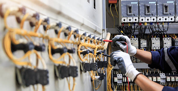 Professional Electrician technician working in Double Oak, TX